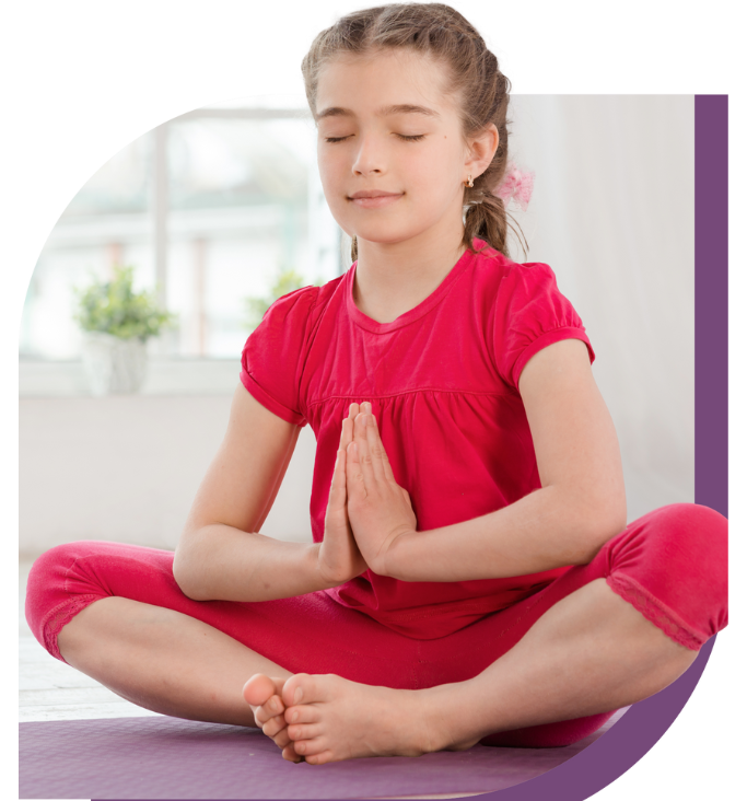 Child doing yoga at Breath and Beat class